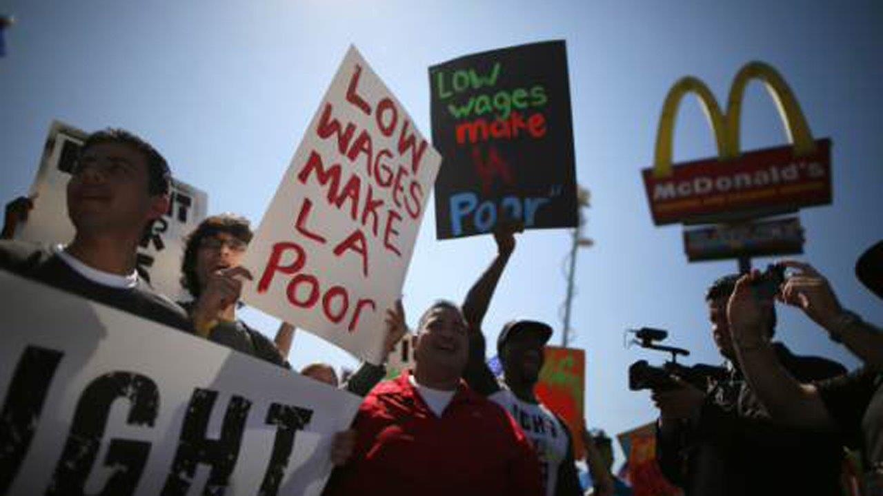 Former McDonald's USA CEO Ed Rensi on the fast food chain unveiling its ‘biggest Big Mac ever’ and the impact of minimum wage hikes on the economy.
