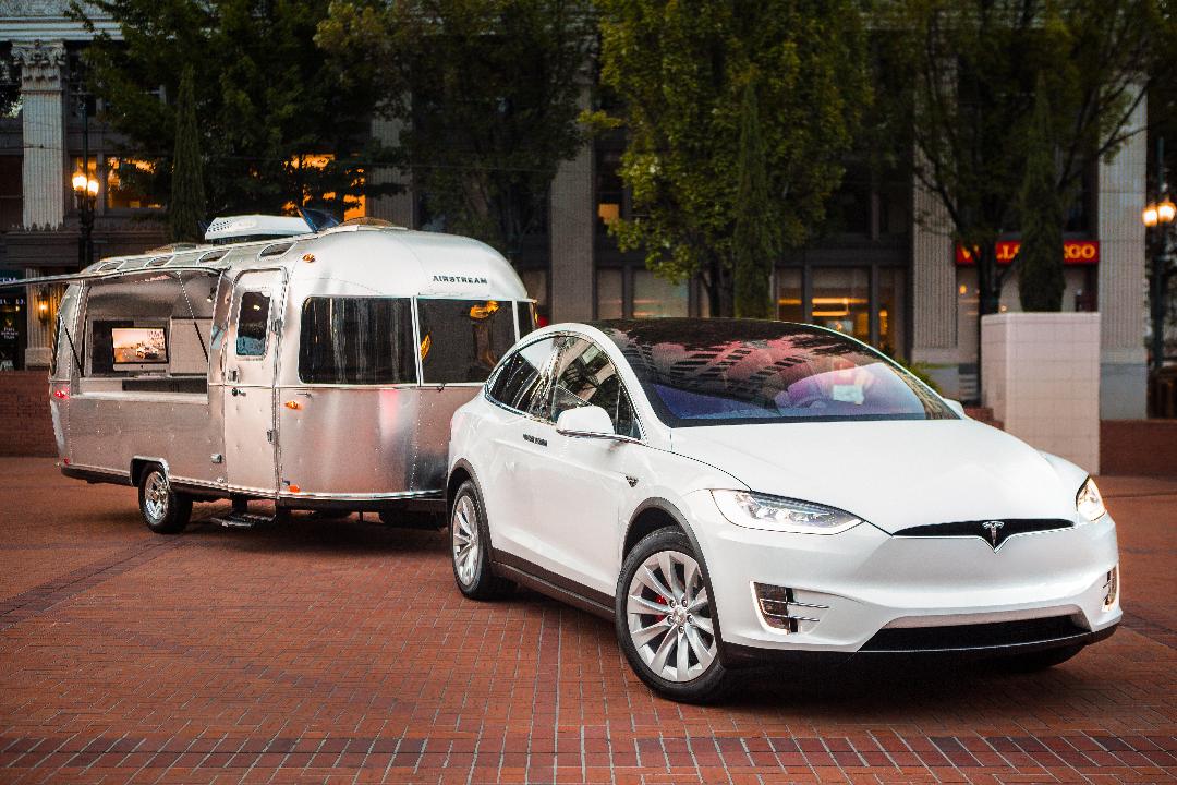 Sit, shop and design your very own Tesla in the company's mobile dealership, currently touring across America.