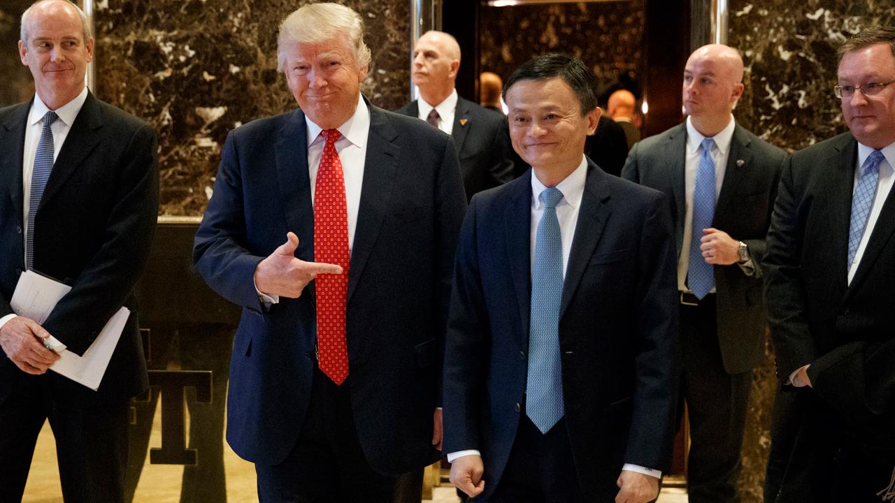 Alibaba founder Jack Ma addresses reporters following his meeting with U.S. President-elect Trump.