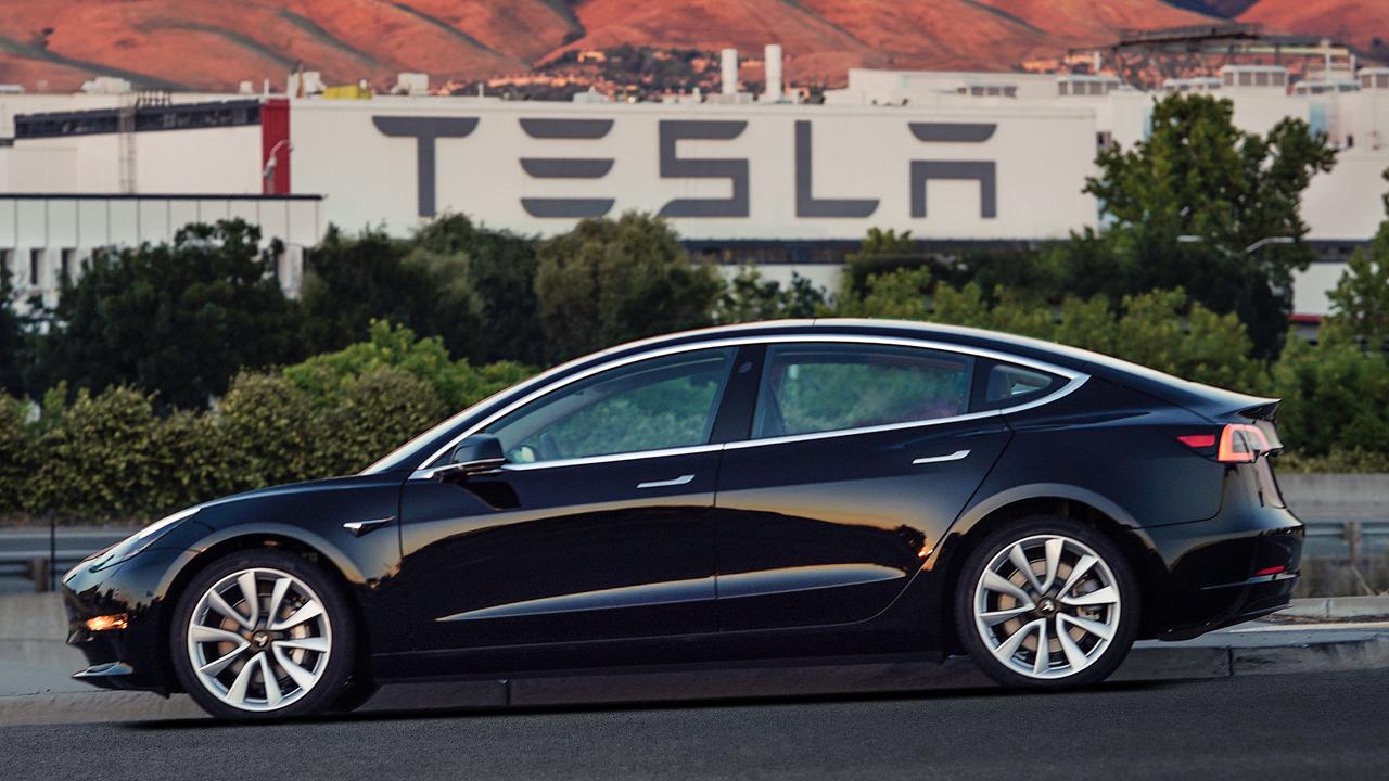 Tesla rolls out the Model 3 with prices starting at $35,000