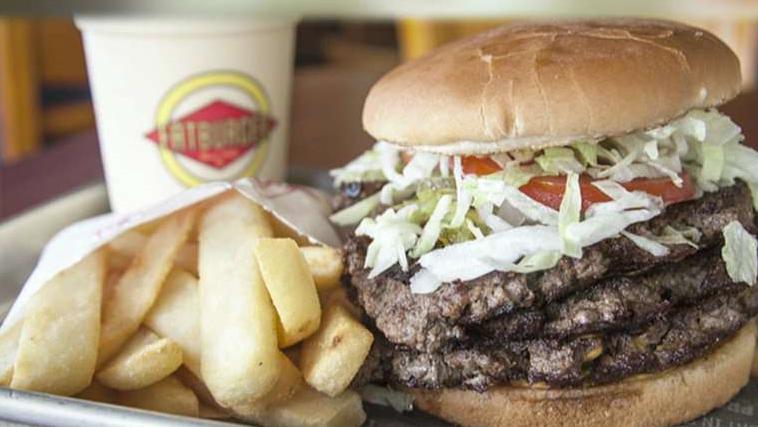 Fatburger CEO Andrew Weiderhorn discusses the impact of automation and higher minimum wage on the restaurant industry. 