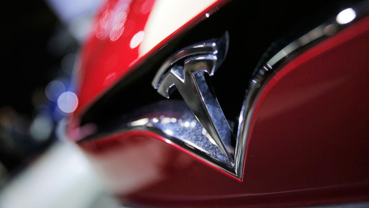 Tech expert Lance Ulanoff explains why Elon Musk needs to sell Tesla to a bigger auto manufacturer, unless he can start churning out the electric vehicles at a higher volume. 