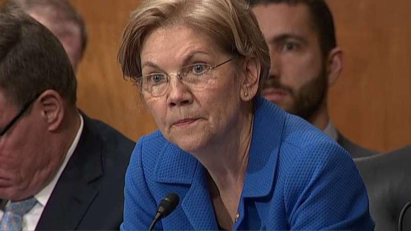 Sen. Elizabeth Warren, (D-Mass.), questions Federal Reserve Chair Jerome Powell.