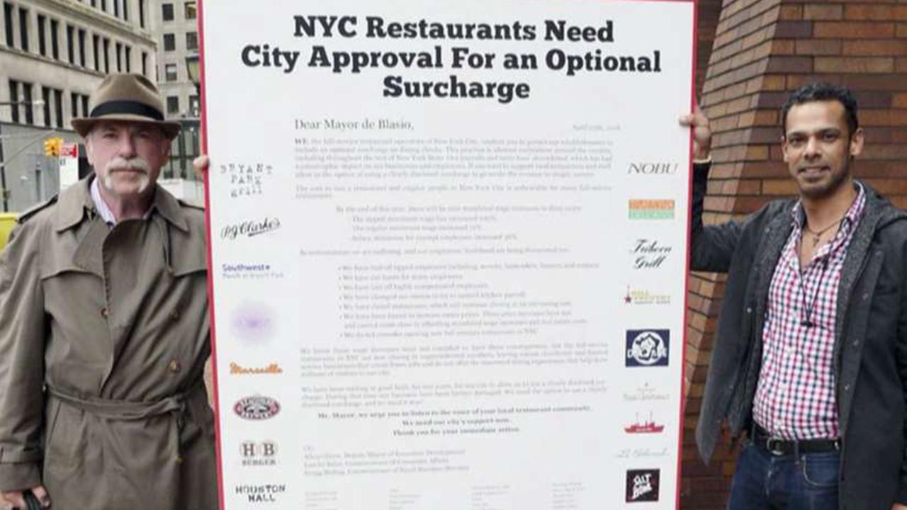 Zane Tankel, who owns 38 Applebee’s restaurants, on how a New York City restaurant group is asking lawmakers to add a surcharge on all diners to help cover rising expenses. 