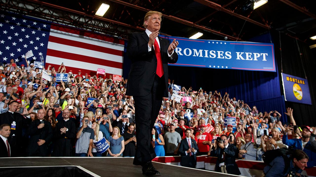 President Trump touts U.S. economic growth while addressing supporters at a Make America Great Again rally in Great Falls, Montana.