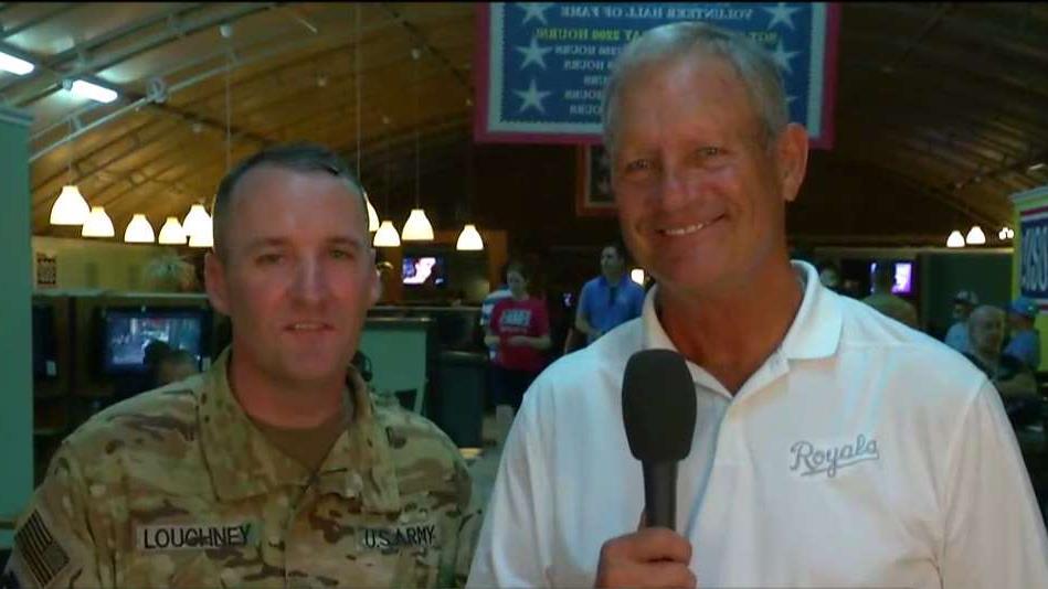 Major League Baseball Hall of Famer George Brett and Lt. Col. Todd Loughney of the Missouri National Guard on K.C. Royals legends joining troops in the Middle East to watch the K.C. Royals 9/11 game.