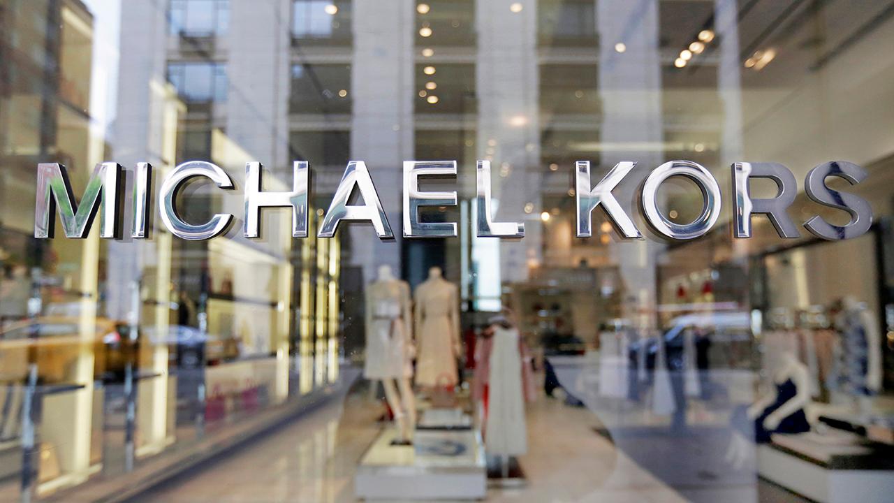 Michael Kors said that it would buy Versace for $2.1 billion.