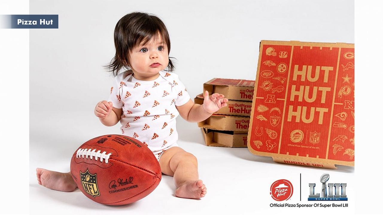 Morning Business Outlook: Pizza Hut, the official pizza sponsor of the NFL, will be giving away free pizza and tickets to next year's Super Bowl to the family of the first born baby after kickoff through an online contest; Facebook is shutting down a controversial spying app for iOS.