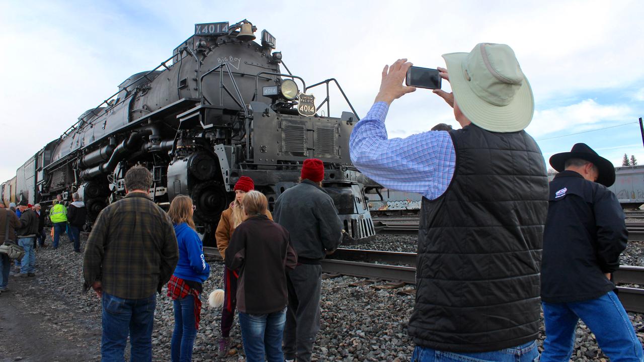 A Big Boy locomotive rolled out of a Union Pacific restoration facility, returning to the rails in Wyoming after five years of refurbishment. The train headed toward Utah as part of a tour commemorating the 150th anniversary of the Transcontinental Railroad. 