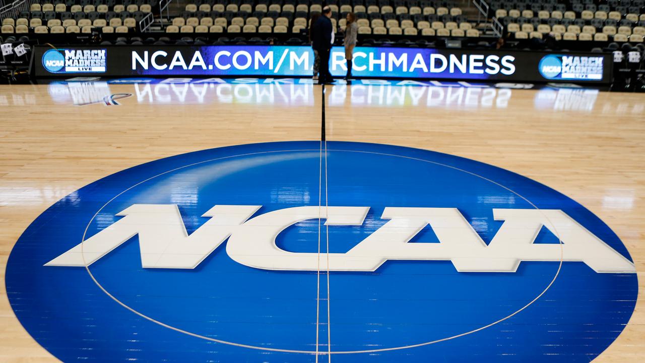 The NCAA threatened to bar California universities from championship games if lawmakers pass a bill allowing student-athletes to profit from their image and likeness.