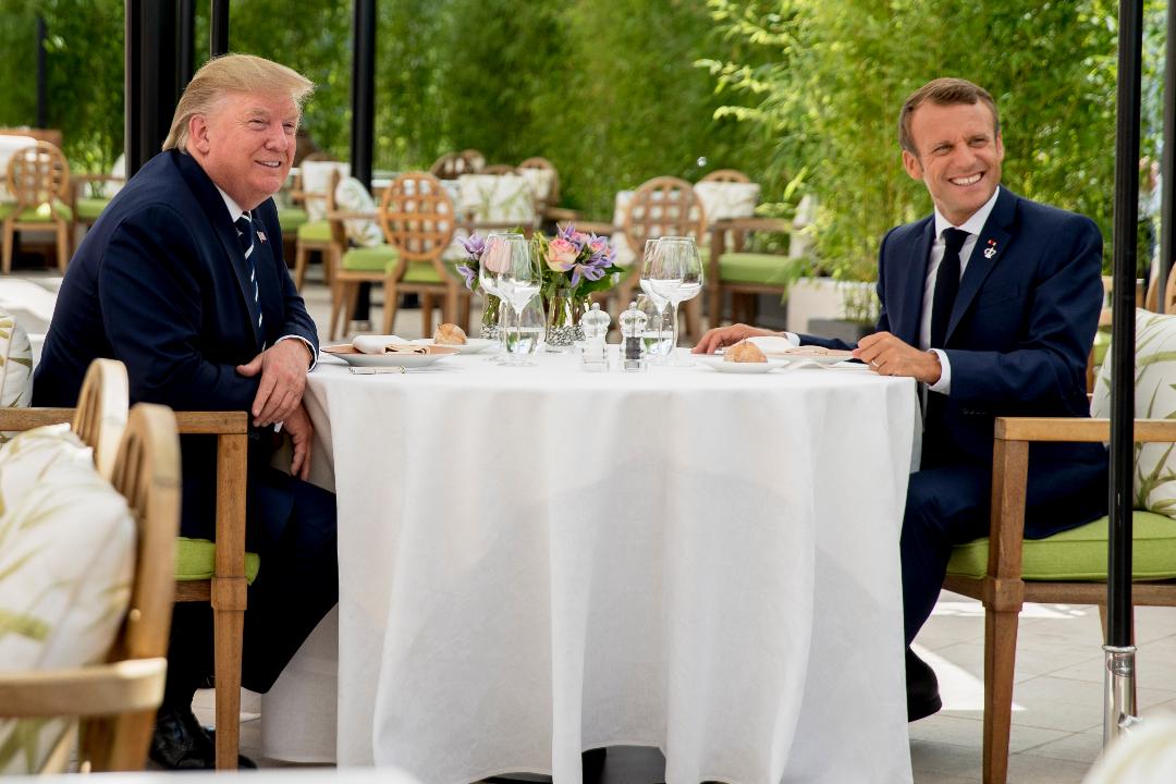 The president arrives to dine with other world leaders on the first evening of the G-7 summit.