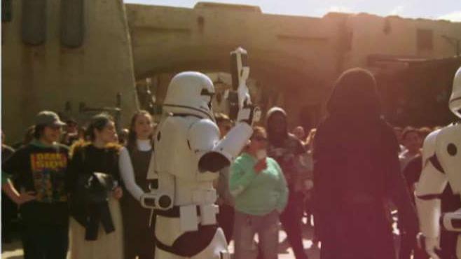 Fortune Executive Editor Adam Lashinsky and CFRA Director Tuna Amobi on reports Disneyland's 'Star Wars' Land opened to disappointing crowds.