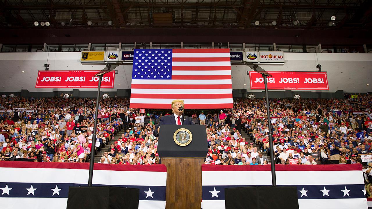 President Trump talks about his new China tariff during a rally in Cincinnati, Ohio.