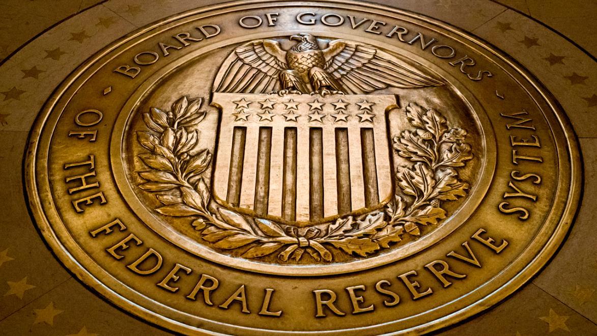 The Federal Reserve will require eight large insurance companies to raise their capital requirements in a preemptive safety move.