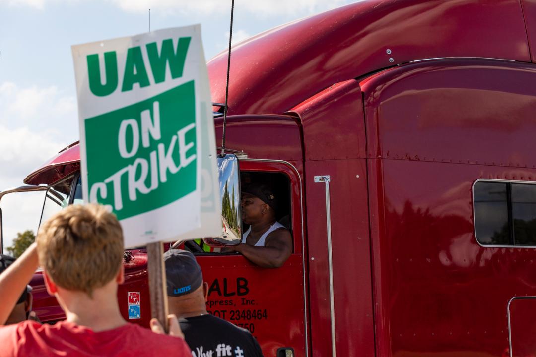 Grady Trimble reports in from day three of the GM UAW strike in Detroit after strikers' health benefits were dropped.