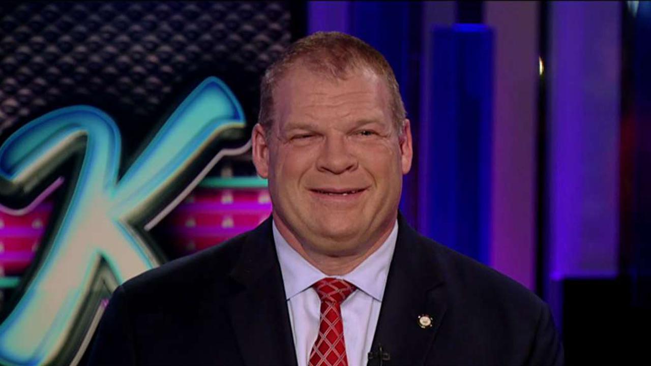 WWE superstar and Mayor Glenn ‘Kane’ Jacobs discusses transitioning from the wrestling world to the political world and his new book. 