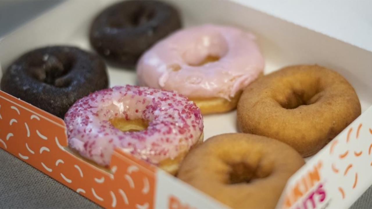 Morning Business Outlook: Dunkin' offering active duty military a free doughnut of their choice for Veterans Day; WalletHub survey shows 33 million Americans say they don't have money for a winter vacation and NerdWallet says millennials are worrying over credit card and student debt.