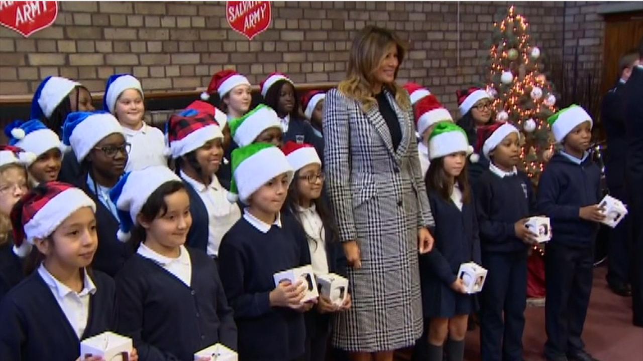 First Lady Melania Trump pays a visit to Salvation Army Centre in Clapton, East London, to meet local children and prepare holiday gifts for less fortunate community members.