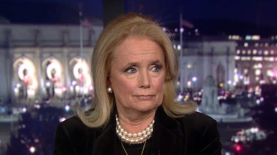 Rep. Debbie Dingell, a Michigan Democrat, responds to President Trump’s comments about her late husband during his Battle Creek, Michigan, speech. 