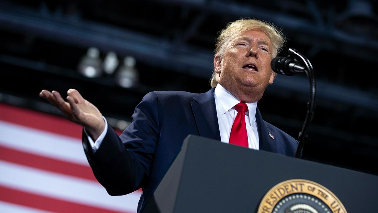 President Trump talks about Ford investing and creating jobs in Michigan at a ‘Keep America Great’ rally in Battle Creek, Michigan, on Wednesday night. 