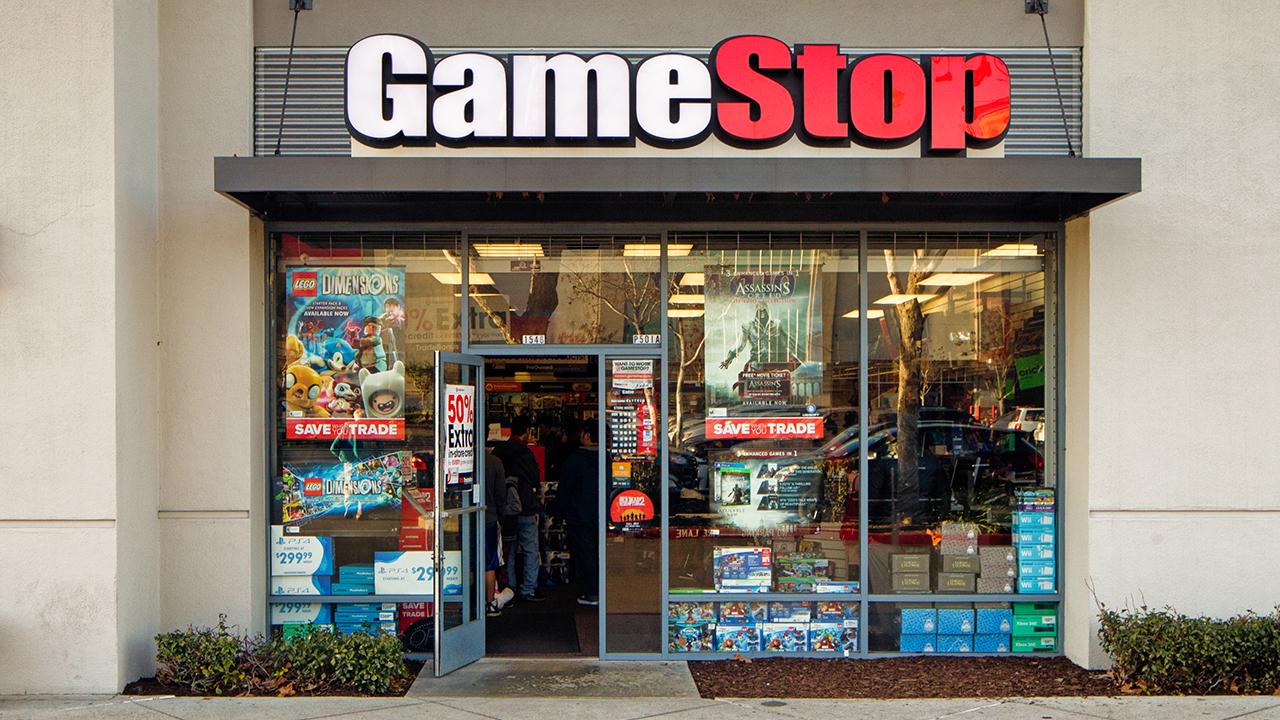 Gamestop stock plummets due to weak holiday and in-store sales, struggling to stay afloat in a digital universe.
