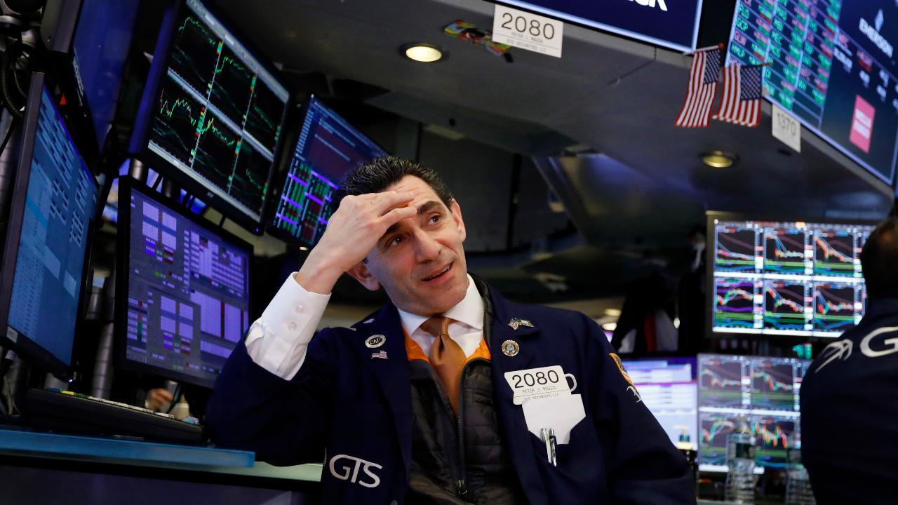 Stocks are down in response to the coronavirus outbreak as China expands travel restrictions.