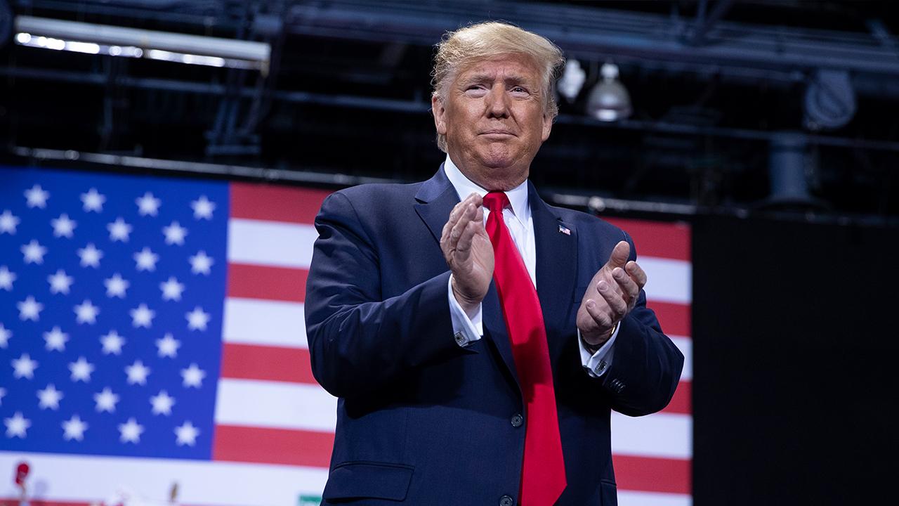 President Trump says companies are 'coming back' to the U.S. due to the strong economy while speaking to supporters at a ‘Keep America Great’ rally in Wildwood, New Jersey.