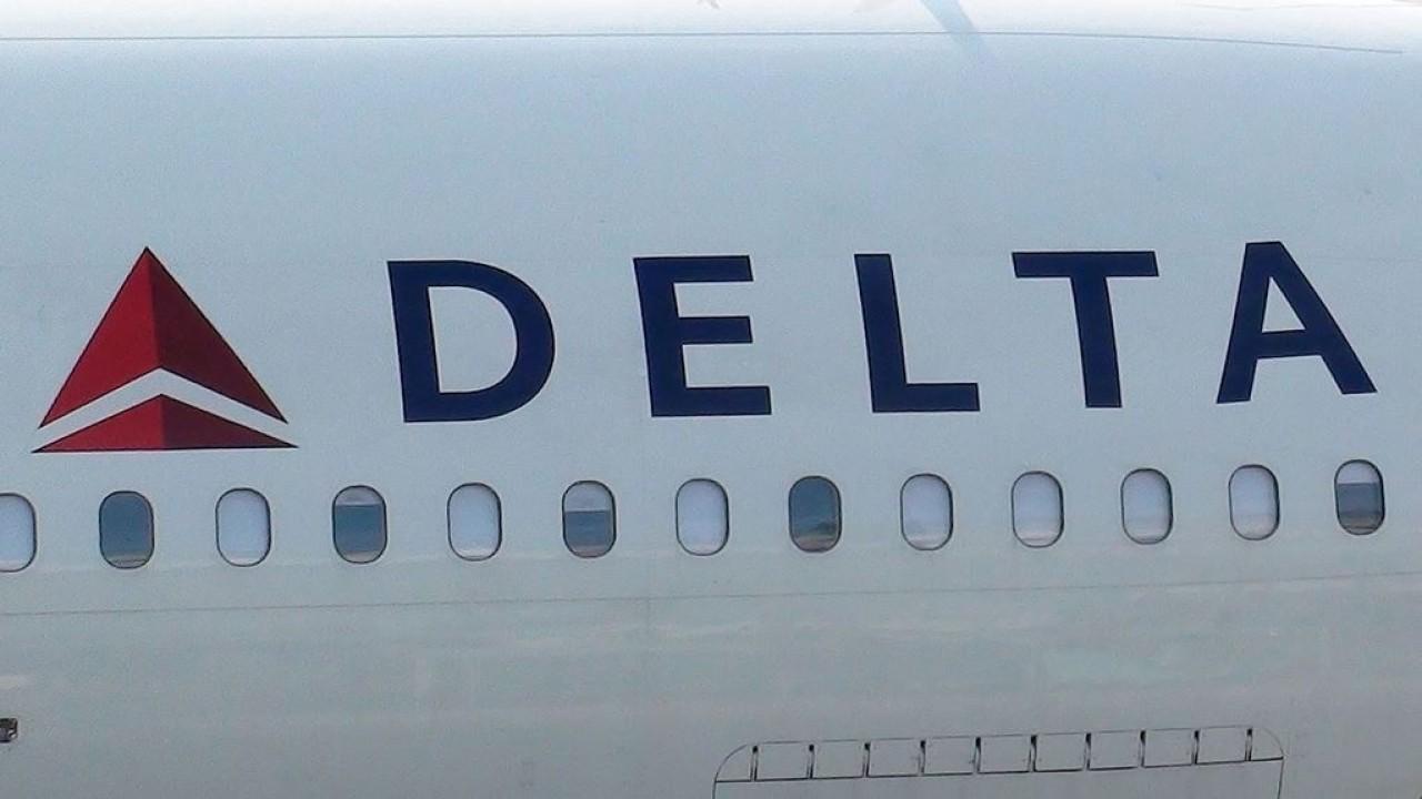Delta joins rival American in trimming flight schedules as the COVID-19 outbreak curbs ticket demand.