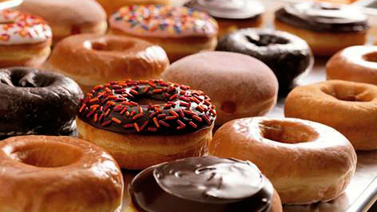 Morning Business Outlook: Dunkin' joins the fast-food breakfast battle by offering a free donut every Friday for the entire month of March with a purchase of a drink through their app.