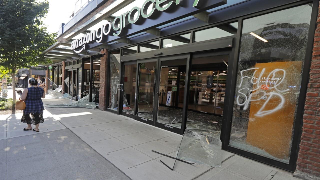 The Domain storefronts boarded up after reports of looting in