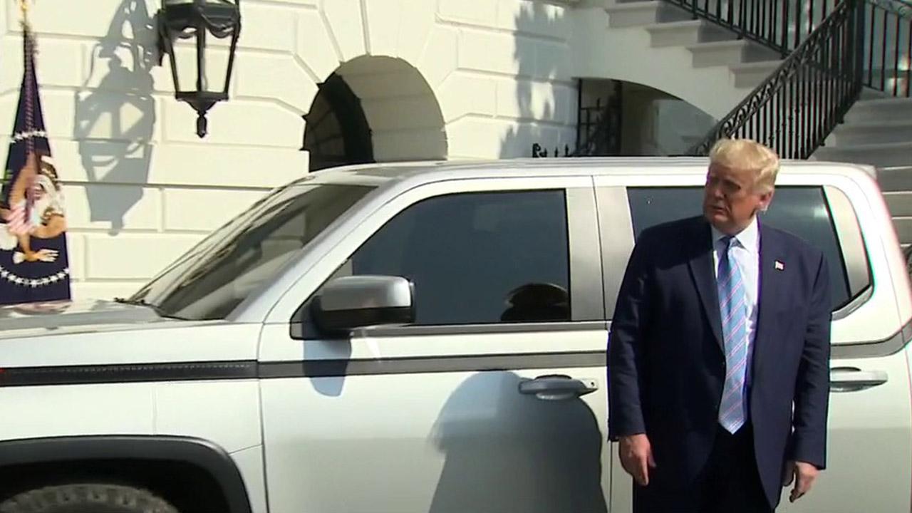 President Trump views a Lordstown Motors electric truck at the White House and speaks on electric vehicle technology. 