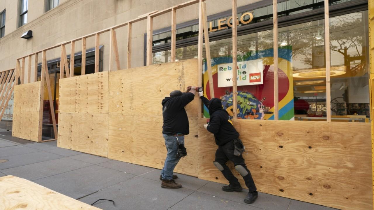 Businesses across New York City are being boarded up in case of election unrest. FOX Business' Kristina Partsinevelos with more.