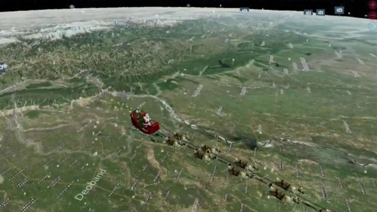Vice Admiral Michael J. Dumont, U.S. Navy Northern Command Deputy Commander, gives an update on where Santa is across the world using NORAD technology like radar and satellites. 