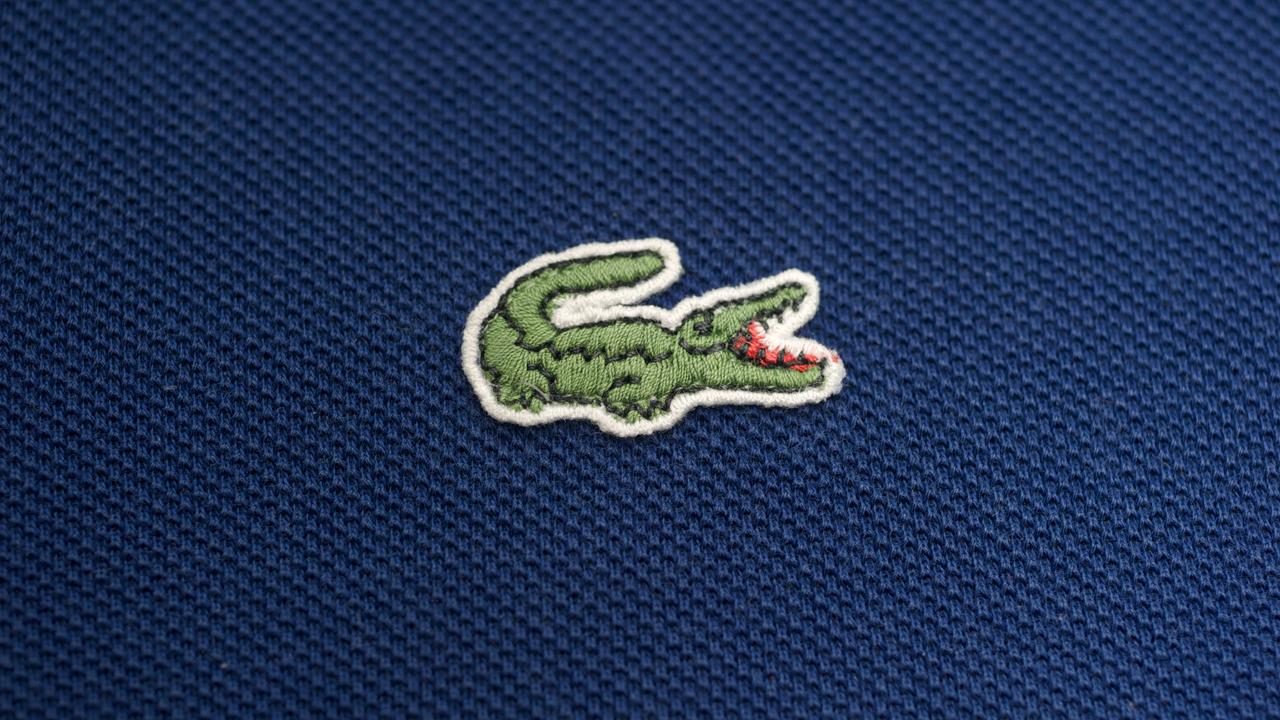 lacoste swaps famous crocodile logo for ten endangered species